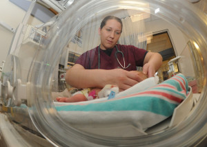 child in neonatal care